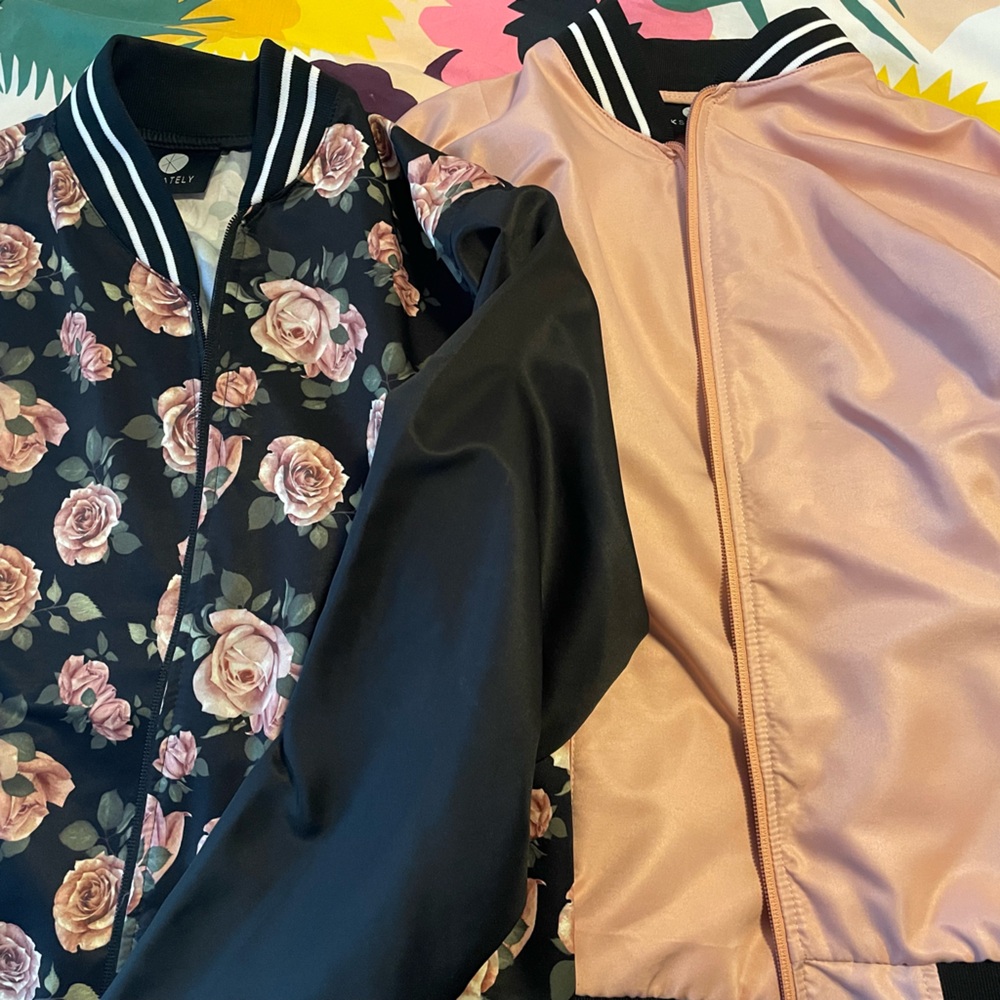 Two K.Stately light bomber jackets, in pink and black floral. Men’s XS.
